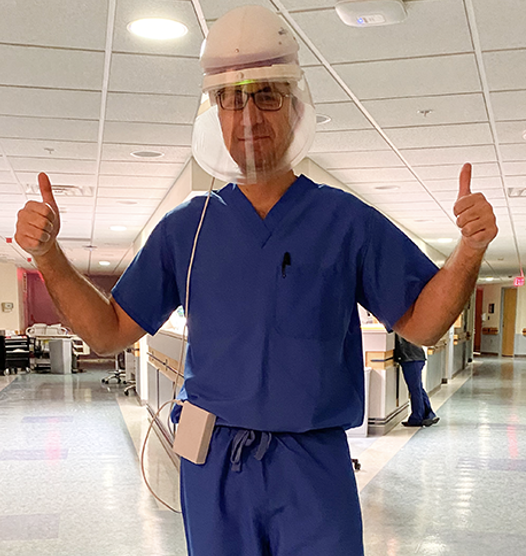 A RyniX clinician at work in the hospital.